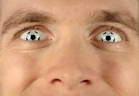 referee seeing soccer resp. football